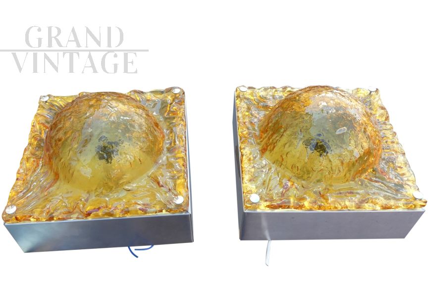 Pair of 70's wall lights in yellow ocher glass