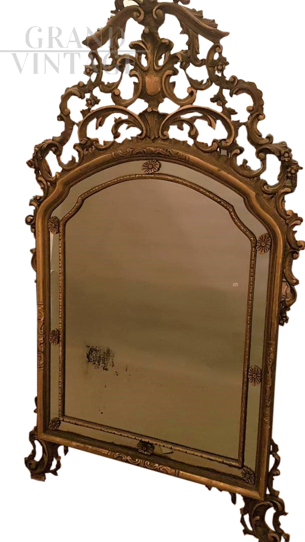 Mirror in carved and gilded wood