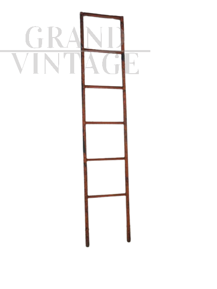 Industrial red metal ladder from the 70s