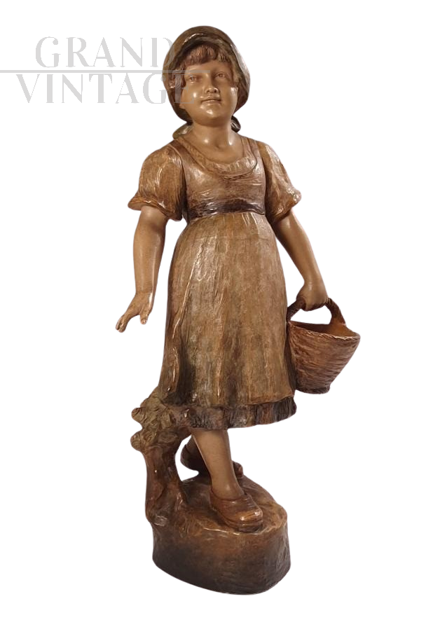 Goldscheider sculpture of a girl in terracotta