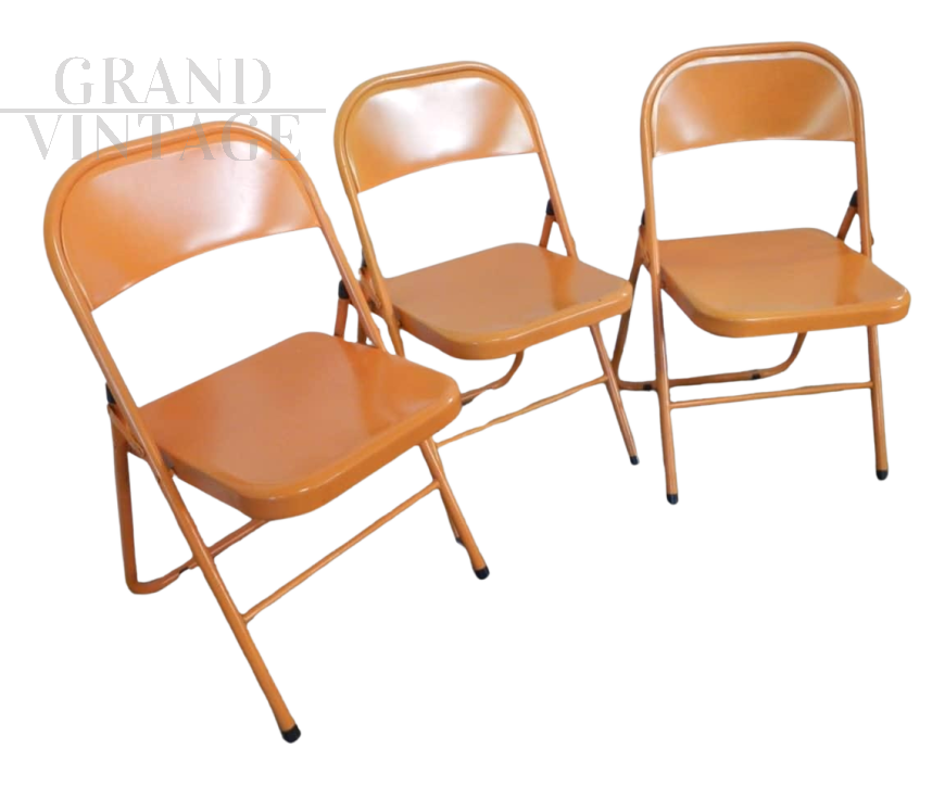 Set of 3 orange metal folding chairs, 1970s