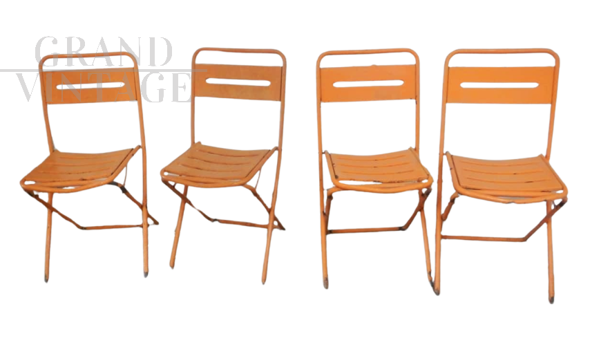 Set of 4 orange iron folding garden chairs, 1970s           