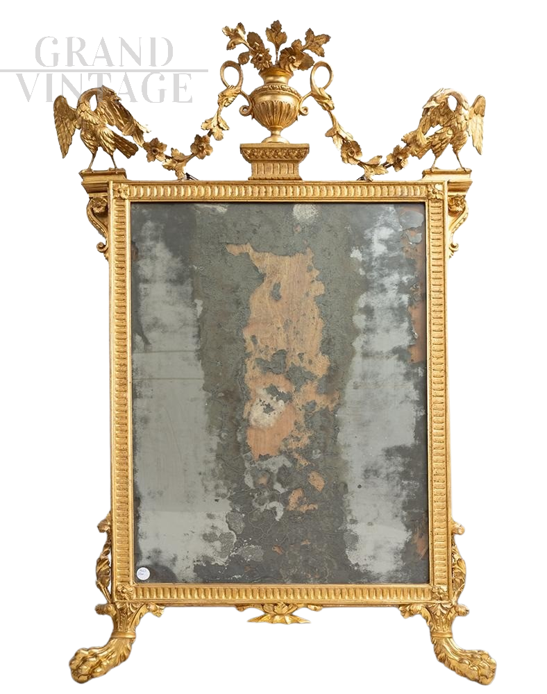 Antique Louis XVI mirror from the 18th century in gilded and carved wood