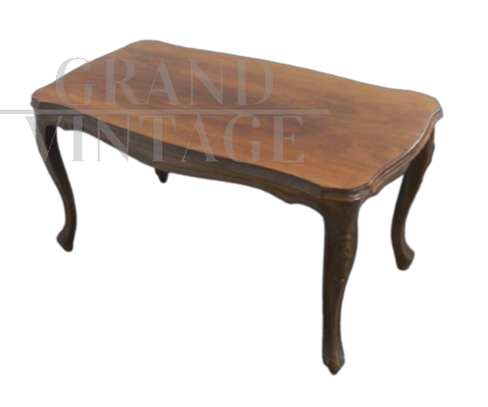 Vintage coffee table with wavy and carved legs                     
                            