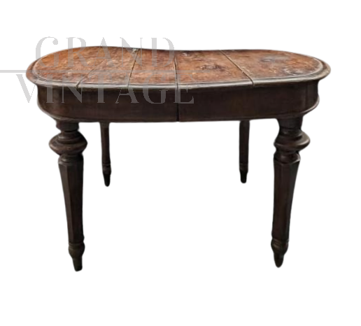 Antique extendable table with oval top