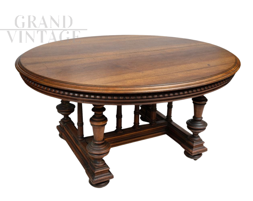 Antique oval extendable table from the French Henry II era